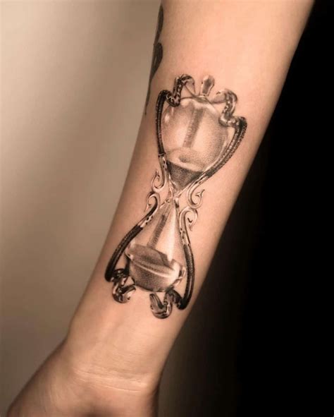 meaningful hourglass tattoos for females|Hourglass Tattoo: Symbolism, Meaning, and。